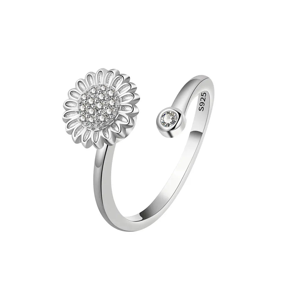 ELYSIUM sunflower fidget ring – rotating relief for daily stress.