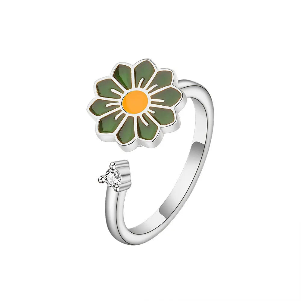 ELYSIUM sunflower fidget ring – rotating relief for daily stress.