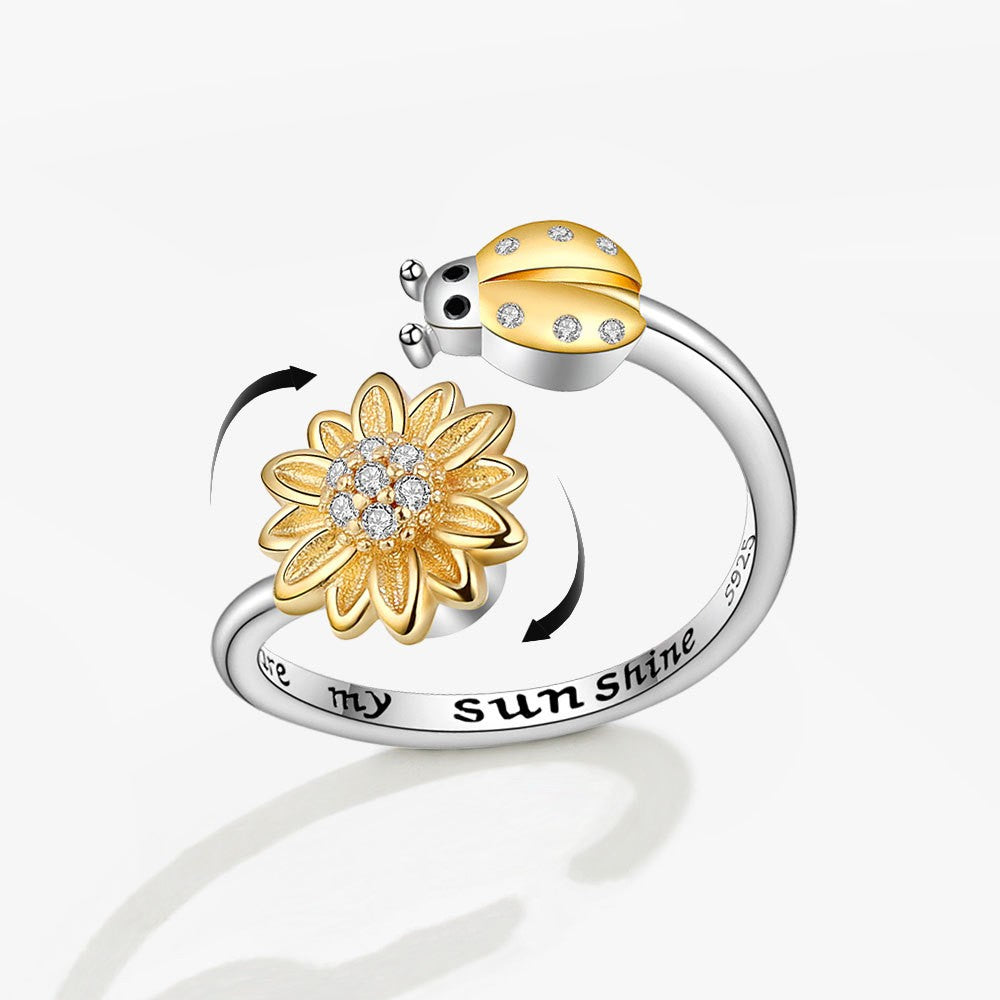 ELYSIUM sunflower fidget ring – rotating relief for daily stress.