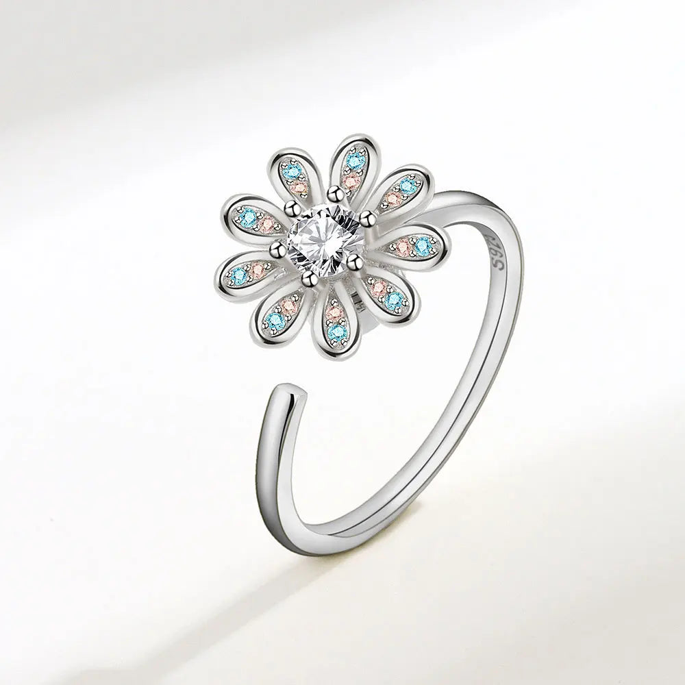 ELYSIUM sunflower fidget ring – rotating relief for daily stress.