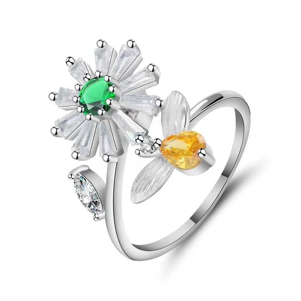 ELYSIUM sunflower fidget ring – rotating relief for daily stress.