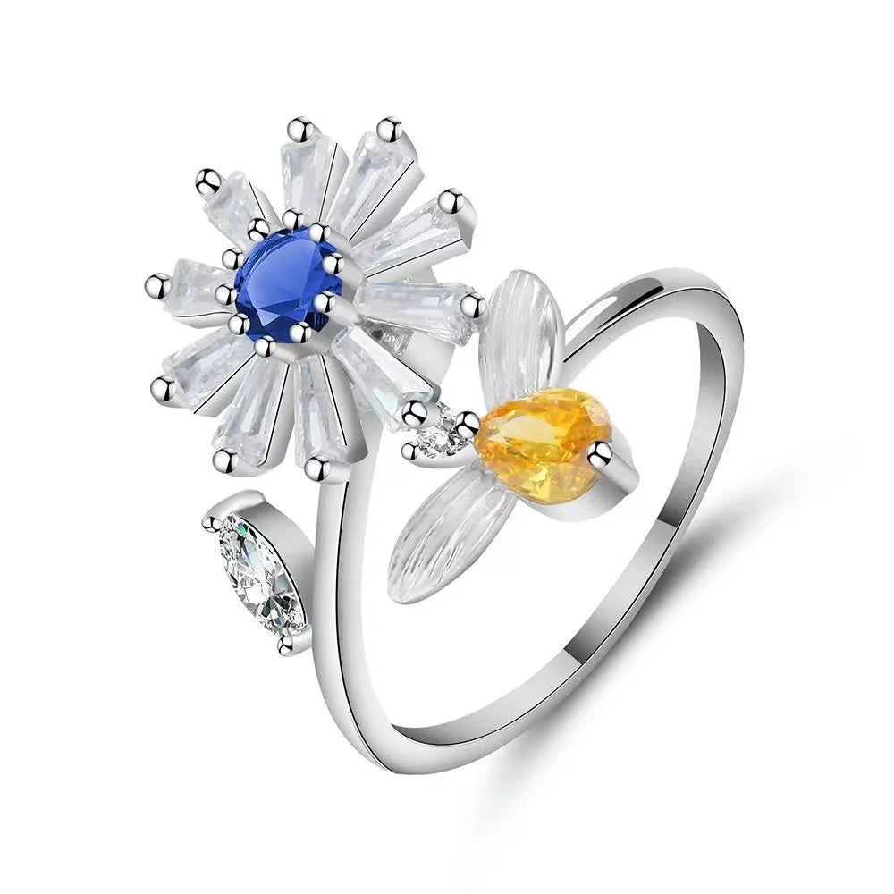 ELYSIUM sunflower fidget ring – rotating relief for daily stress.