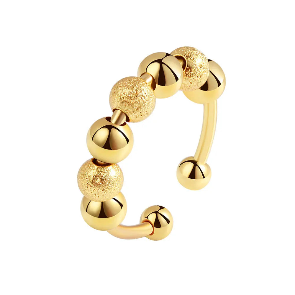 ELYSIUM sunflower fidget ring – rotating relief for daily stress.