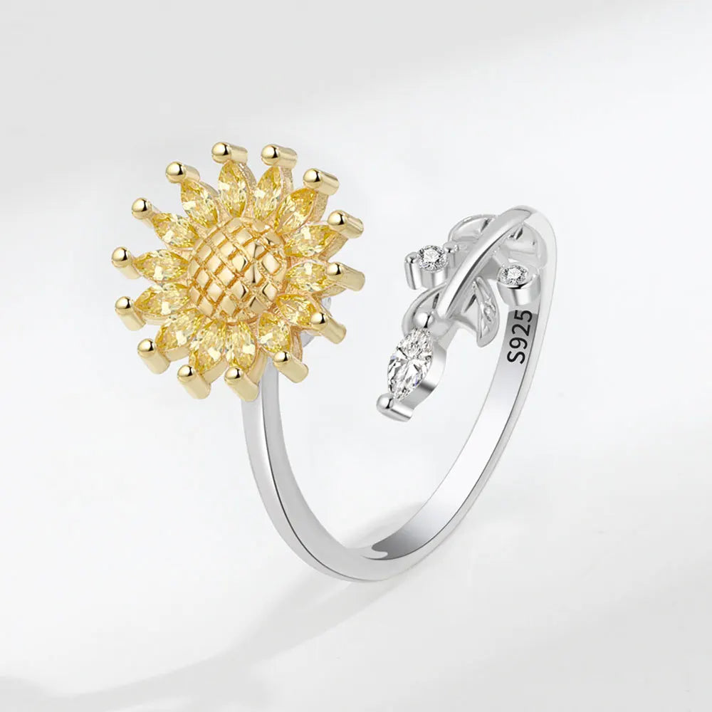 ELYSIUM sunflower fidget ring – rotating relief for daily stress.
