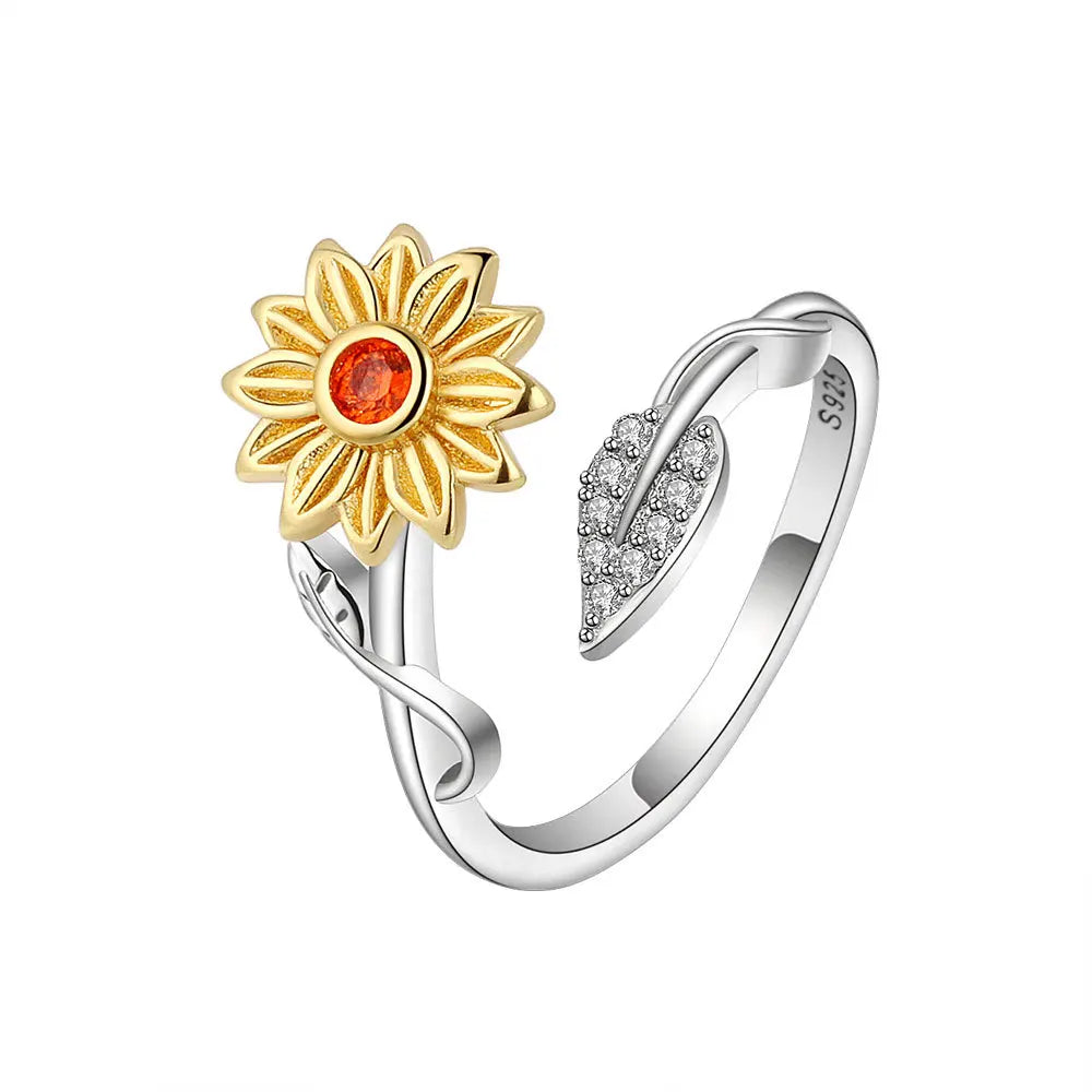 ELYSIUM sunflower fidget ring – rotating relief for daily stress.
