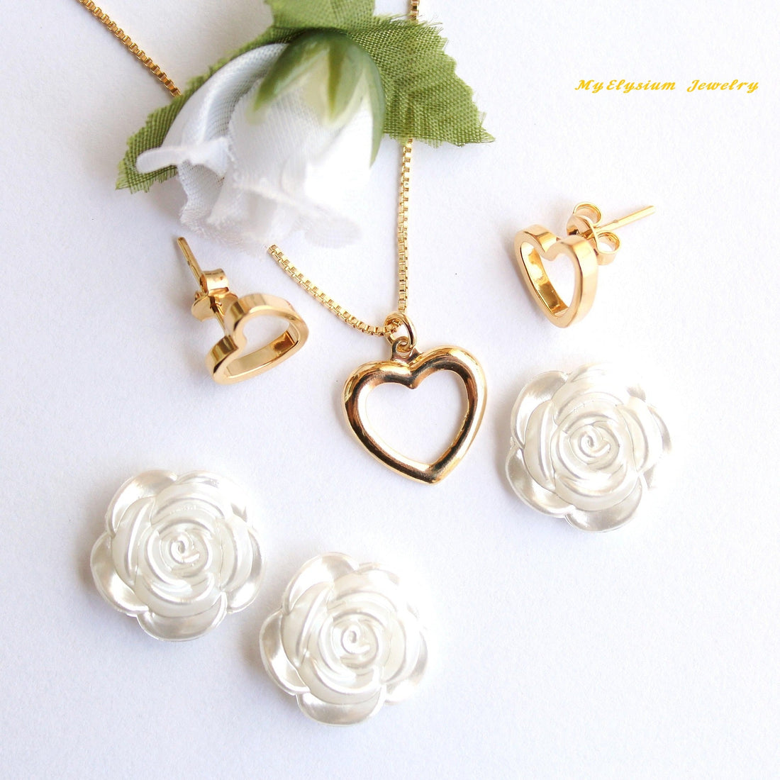 Browse Luxury Jewelry Online: Discover Customizable Name Necklaces, Silver Charm Bracelets, and 18K Gold Engagement Rings at My Elysium Jewelry