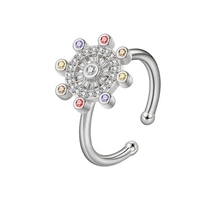 ELYSIUM sunflower fidget ring – rotating relief for daily stress.