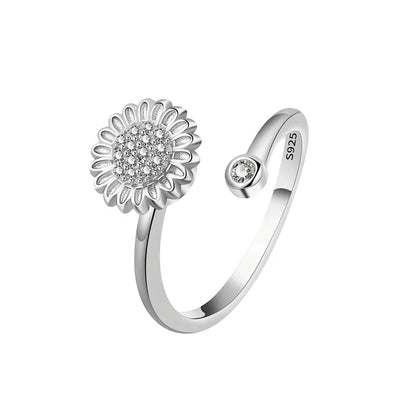 ELYSIUM sunflower fidget ring – rotating relief for daily stress.