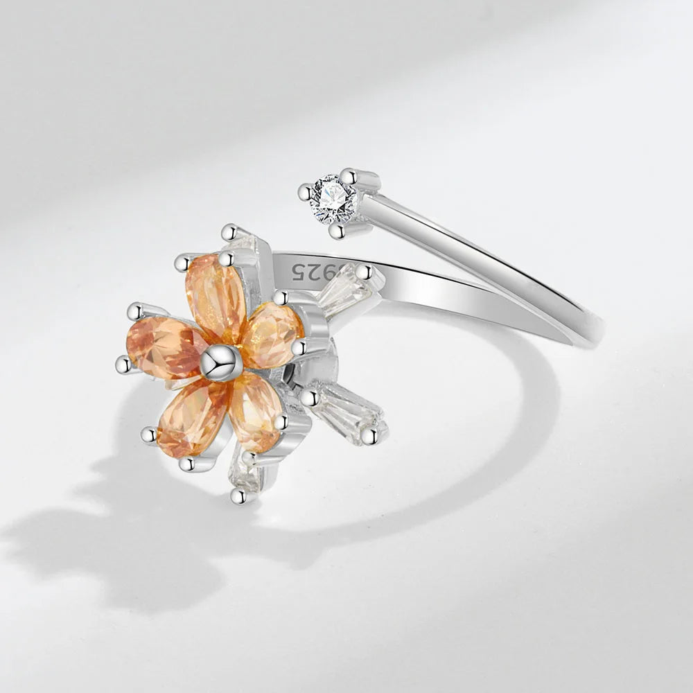ELYSIUM sunflower fidget ring – rotating relief for daily stress.