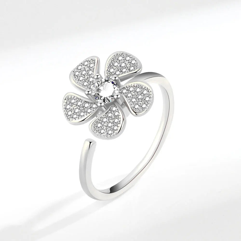 ELYSIUM sunflower fidget ring – rotating relief for daily stress.
