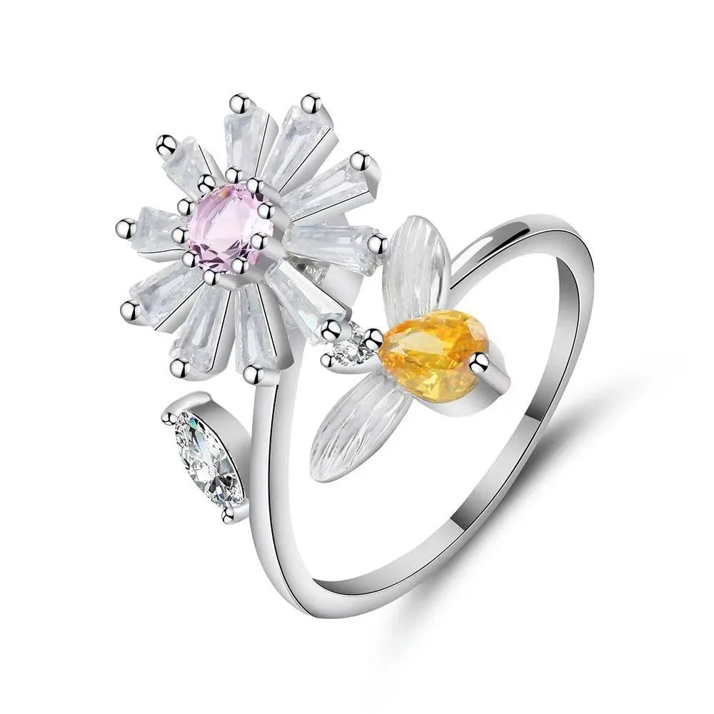 ELYSIUM sunflower fidget ring – rotating relief for daily stress.