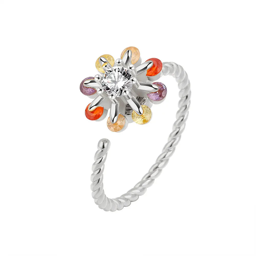 ELYSIUM sunflower fidget ring – rotating relief for daily stress.