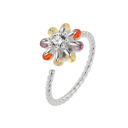 ELYSIUM sunflower fidget ring – rotating relief for daily stress.