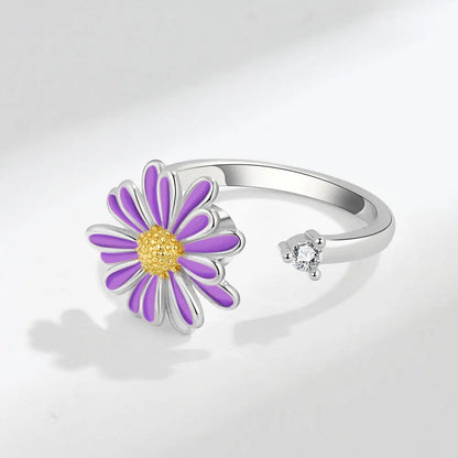 ELYSIUM sunflower fidget ring – rotating relief for daily stress.
