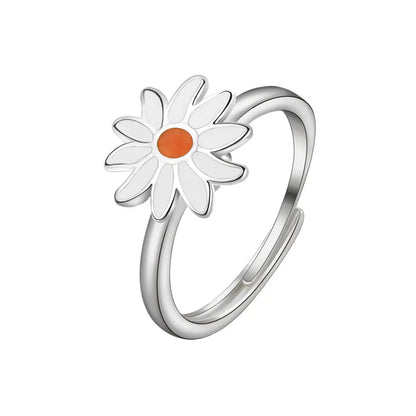 ELYSIUM sunflower fidget ring – rotating relief for daily stress.